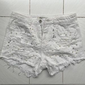 White distressed denim beaded shorts